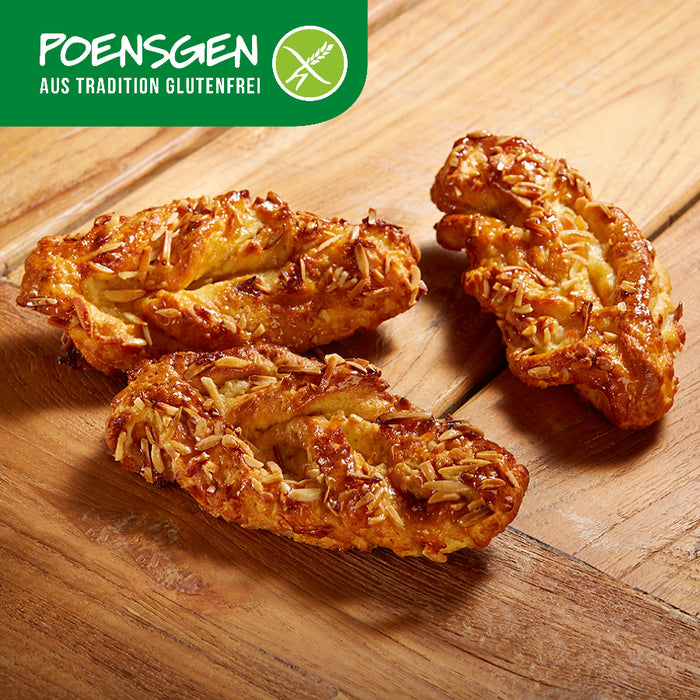 Mandel-Nuss-Plunder glutenfrei 2x110g - Poensgen
Unsere Mandel-Nuss-Plunder vereinen zarten Teig, aromatische Haselnüsse und Mandeln zu einem unwiderstehlichen Frühstücksgenuss. Ideal für alle, die auf Gluten und Laktose verzichten möchten, ohne auf Geschmack zu verzichten. Perfekt zum Kaffee oder Tee – für einen genussvollen Moment ganz ohne Kompromisse.