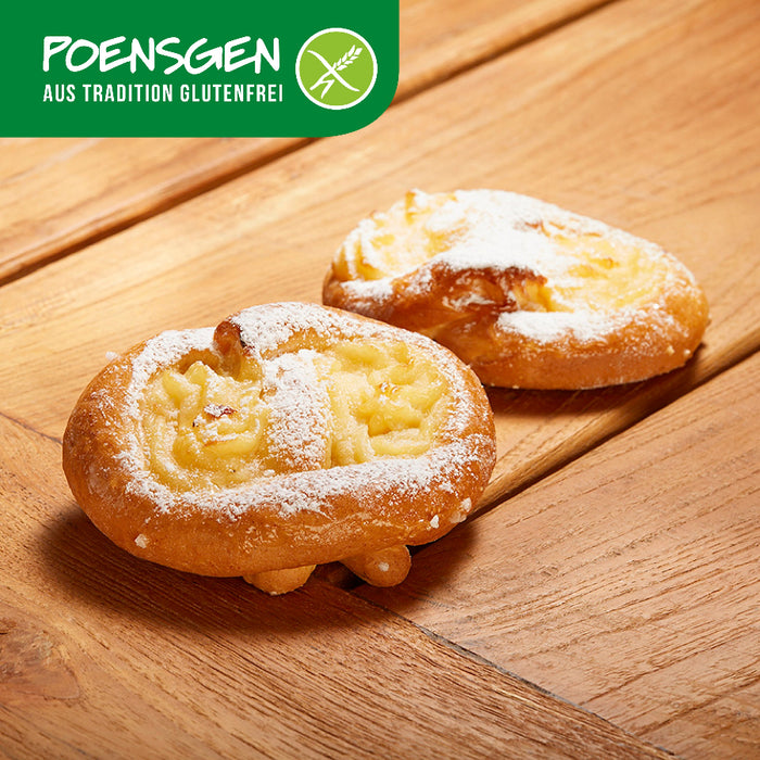 Puddingbrezeln glutenfrei 2x110g - Poensgen
Unsere Puddingbrezeln verbinden zarten Hefeteig mit einer cremigen Puddingfüllung und einem Hauch Puderzucker. Ideal für alle, die auf Gluten verzichten möchten, aber nicht auf Geschmack. Perfekt für den Kaffee, zum Frühstück oder einfach als süßer Snack zwischendurch – für einen genussvollen Moment ganz ohne Kompromisse.